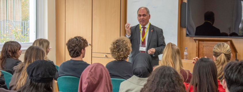 Bambos speaking at Woodhouse College