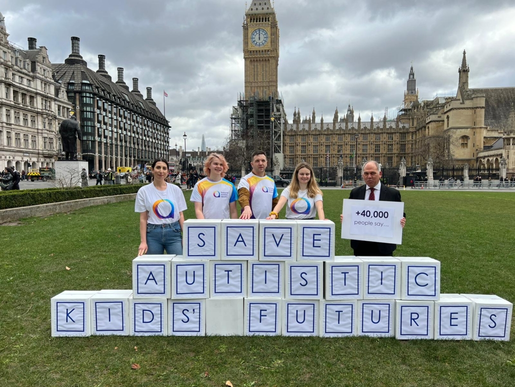 Bambos and the National Autistic Society outside Parliament