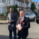 David Lammy and Bambos speaking to campaigners in Palmers Green