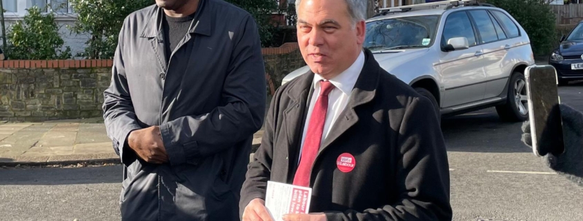 David Lammy and Bambos speaking to campaigners in Palmers Green