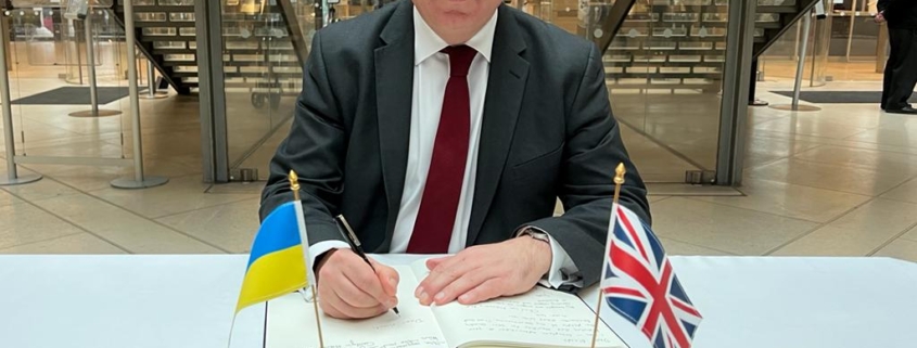 Bambos Charalambous MP signing the UK Parliament Book of Solidarity for Ukraine