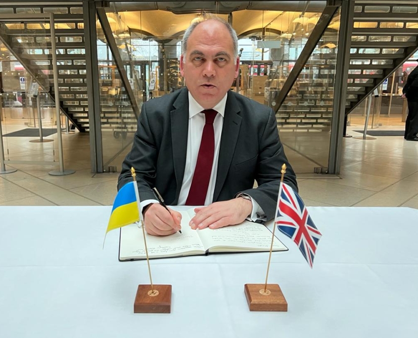 Bambos Charalambous MP signing the UK Parliament Book of Solidarity for Ukraine