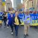 Bambos and Joanne McCartney marching in solidarity with Ukraine