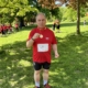 Bambos Charalambous MP holding his medal following the Thalassaemia fun run