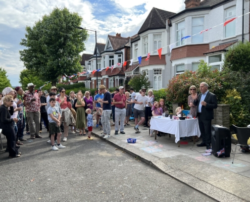 Bambos Charalambous MP speaking at the Ulleswater Road street party