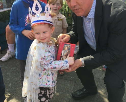 Bambos Charalambous MP awarding the best crown competition at Conway's Jubilee street party