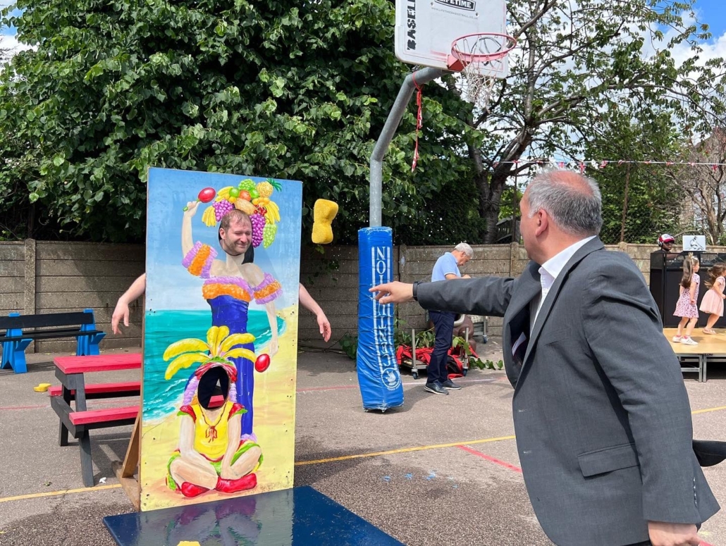 Bambos Charalambous MP throwing a sponge at Mr Newham