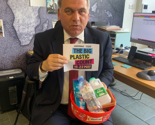 Bambos Charalambous MP participates in the Big Plastic Count photographed in his constituency office