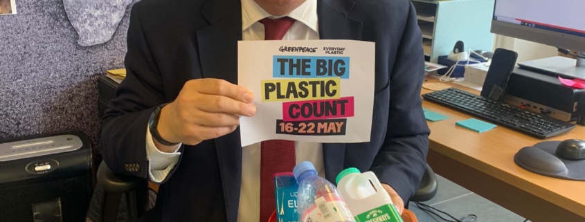 Bambos Charalambous MP participates in the Big Plastic Count photographed in his constituency office