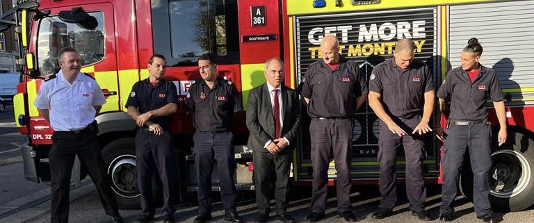 Bambos Charalambous MP and firefighters outside Southgate Fire Station