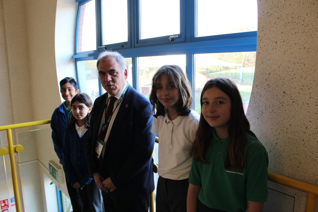 Bambos Charalambous MP and pupils from West Grove primary school