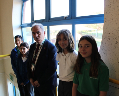 Bambos Charalambous MP and pupils from West Grove primary school