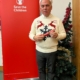 Bambos Charalambous MP wearing a Christmas jumper to support Save the Children's Christmas Jumper Day