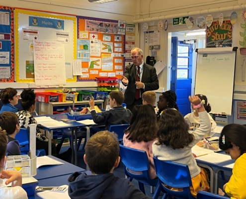 Bambos Charalambous MP speaking to pupils from De Bohun primary school