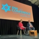 Bambos Charalambous MP and Louise Ellman on stage at the Jewish Labour Movement one day conference