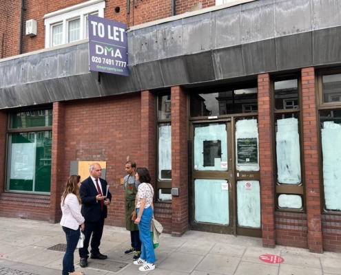 Bambos Charalambous MP with local residents outside the 369-371 Green Lanes site