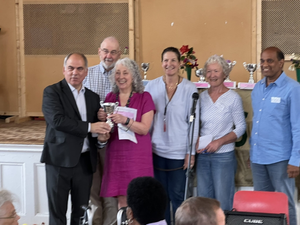 Bambos Charalambous MP attending the Grange Park Horticultural Society Summer Show with some of the entries pictured