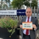 Bambos Charalambous MP campaigning against ticket office closures at Palmers Green station