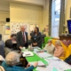 Bambos Charalambous MP speaking to members at Age UK's dementia day centre in Enfield