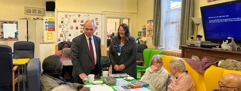 Bambos Charalambous MP speaking to members at Age UK's dementia day centre in Enfield